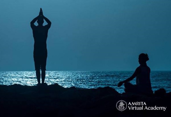 Shadow figures on seashore.